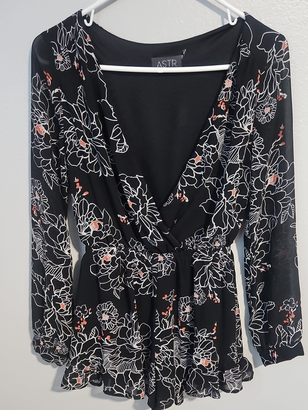 ASTR Black Floral Wrap Romper with Coral Accents